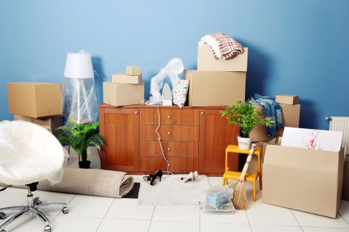 Removal company team preparing boxes for a booked move