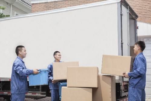 Packing and loading household items for a Soho flat relocation