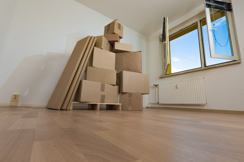 Furniture pick-up service for a Soho flat with a sofa and access stairs