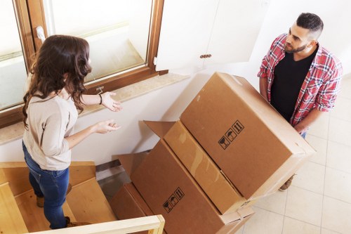 Unpacking and arranging belongings in a Soho apartment