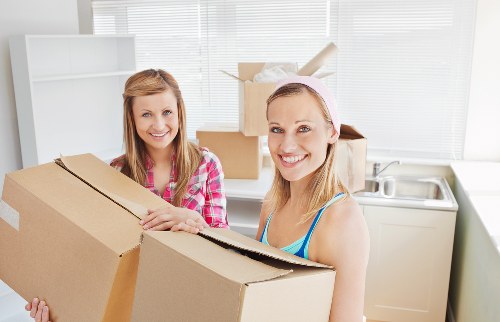 Packed boxes and furniture ready for collection in Soho