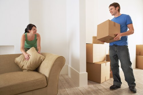 Boxes and household items arranged for a local move in Soho